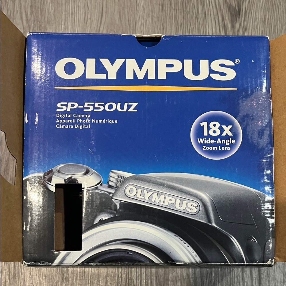 Olympus SP-550UZ Camera with Blue Box